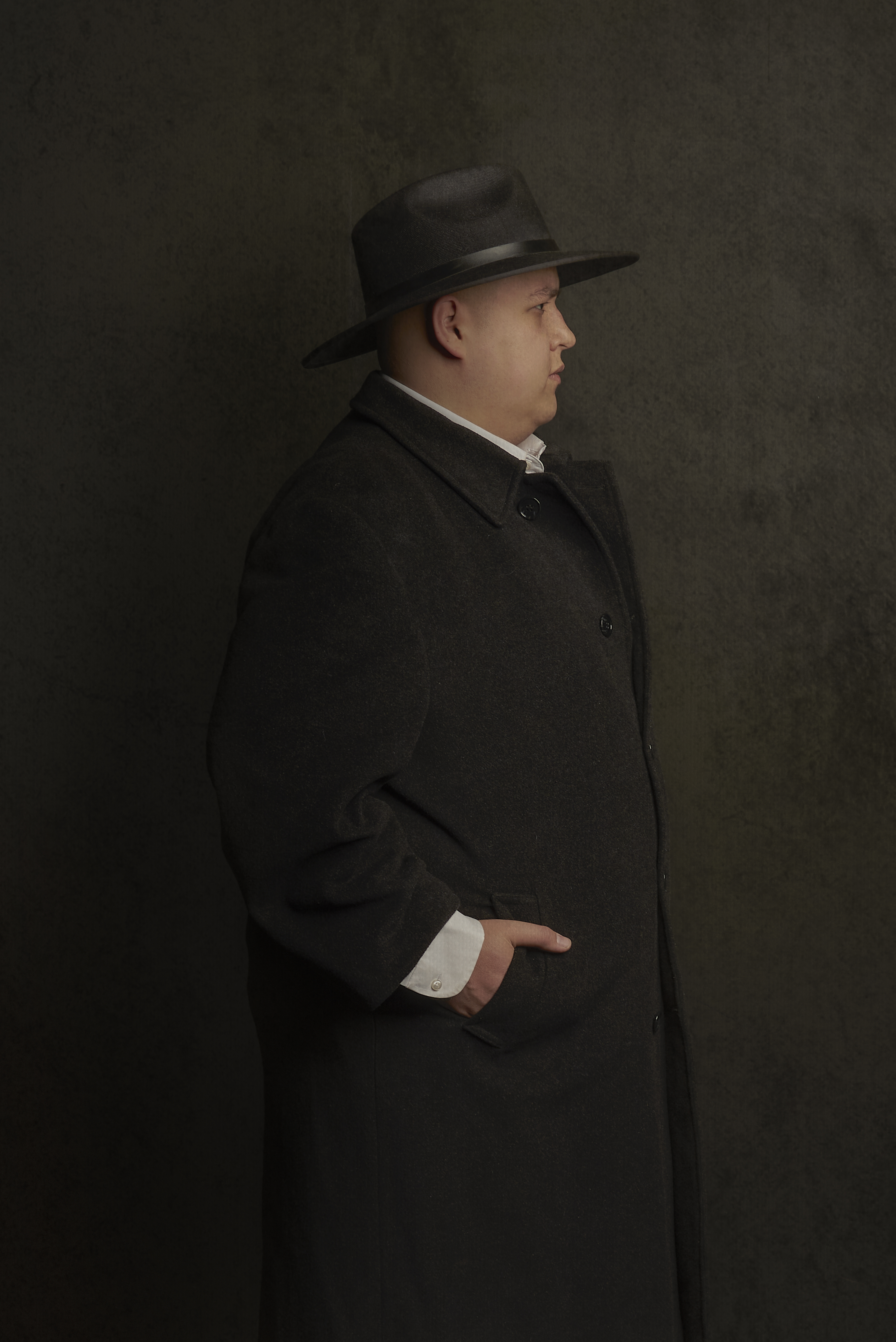 Raúl Alcocer · profile portrait in hat